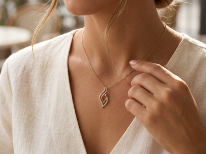 Abstract Flame Round Brilliant Diamond Pendant | Contemporary Fluid Elegance