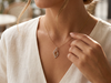 Abstract Flame Round Brilliant Diamond Pendant | Contemporary Fluid Elegance