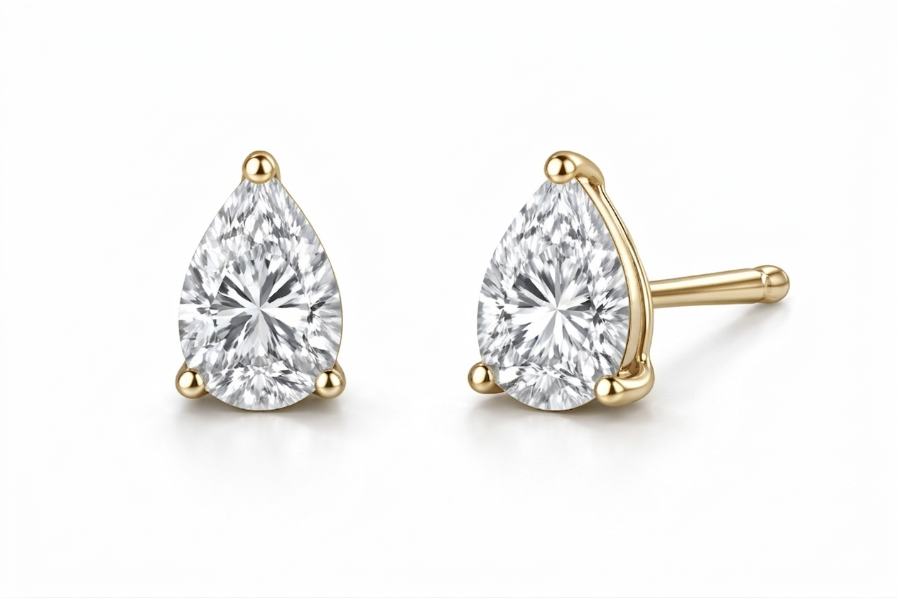 pear cut diamond stud earrings | three-prong martini setting