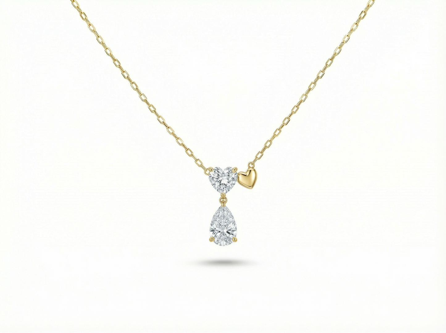0.75 ct heart & pear diamond pendant | prong-set drop design