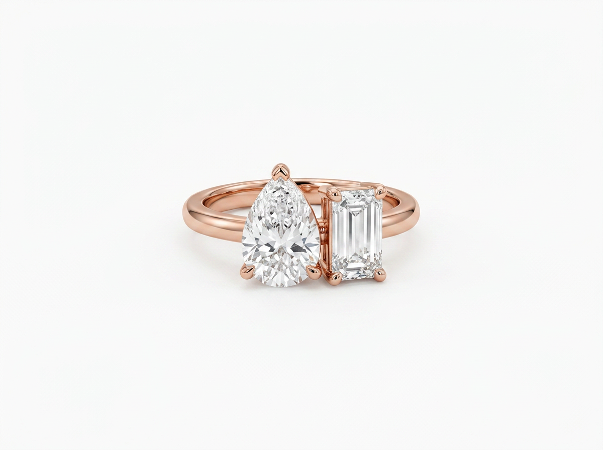 pear & emerald cut diamond toi et moi ring | minimalist two stone design