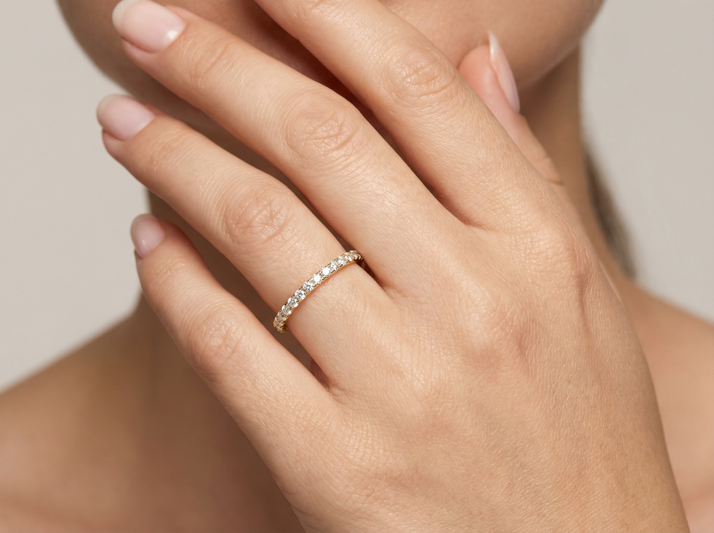 round brilliant cut diamond prong set eternity band | modern prong setting