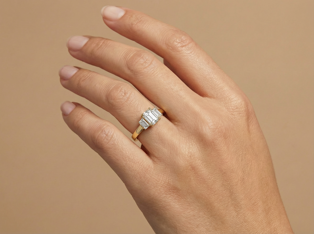 three stone emerald cut diamond engagement ring | emerald cut trilogy setting
