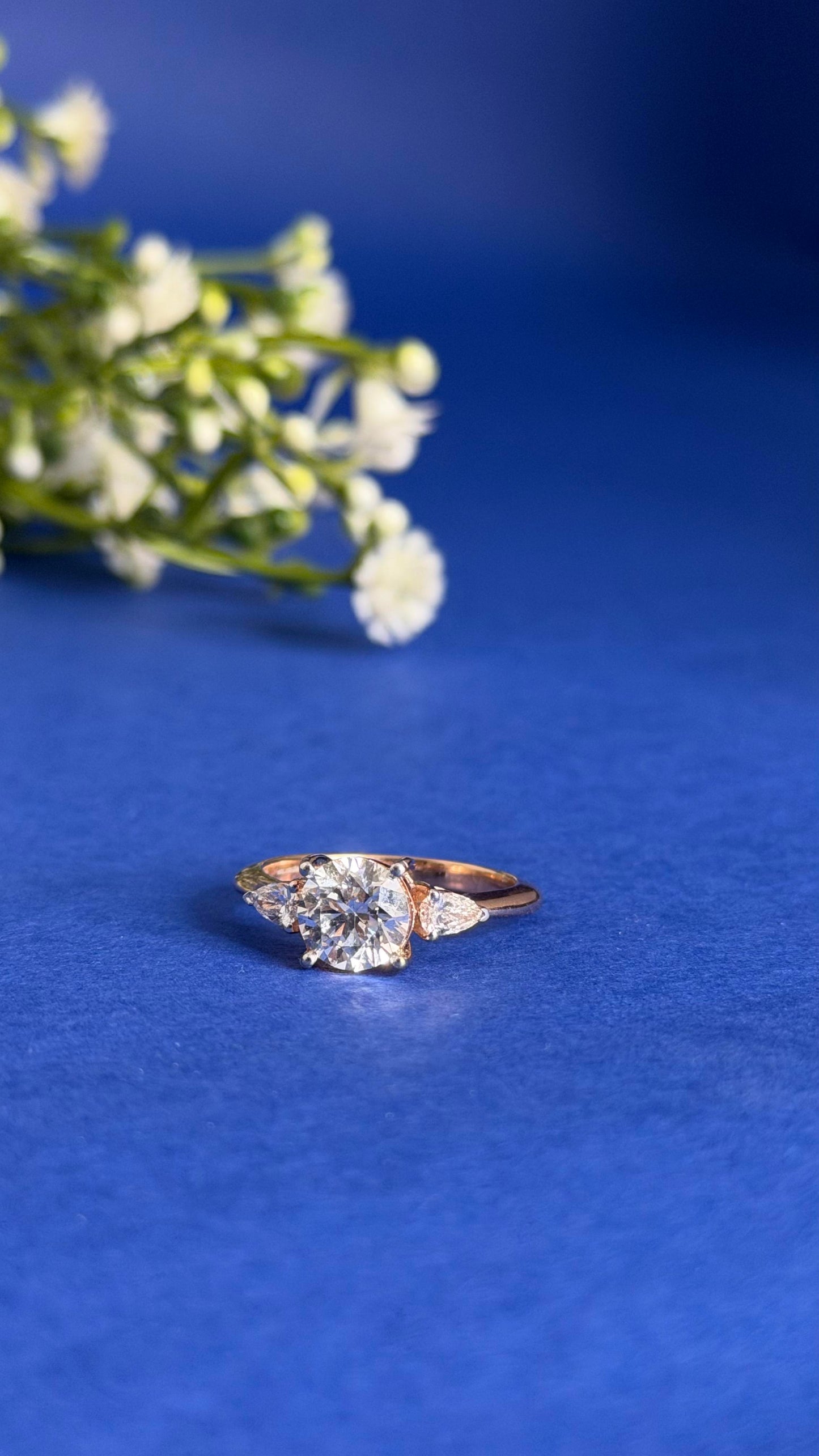 round & pear diamond women's solitaire ring | three stone prong setting