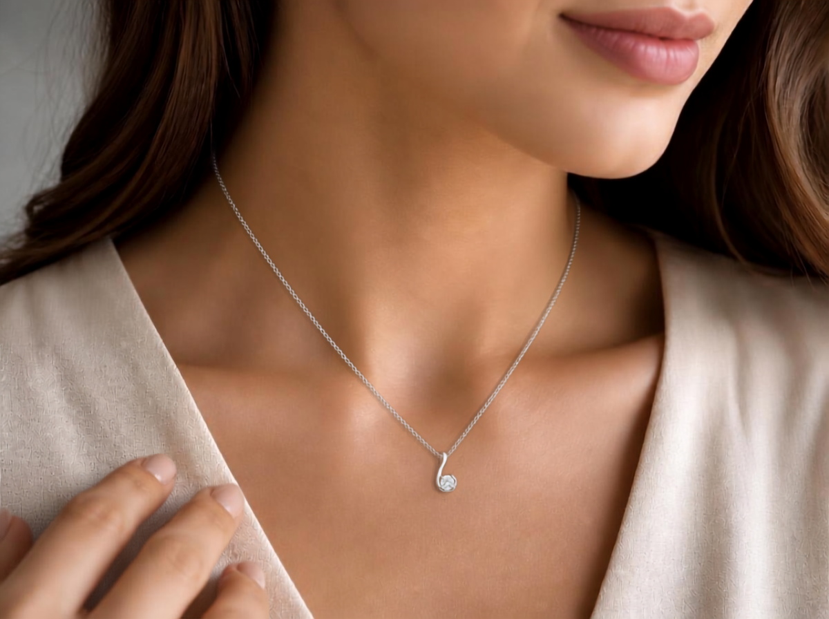 round cut diamond women's pendant | swirl prong solitaire design