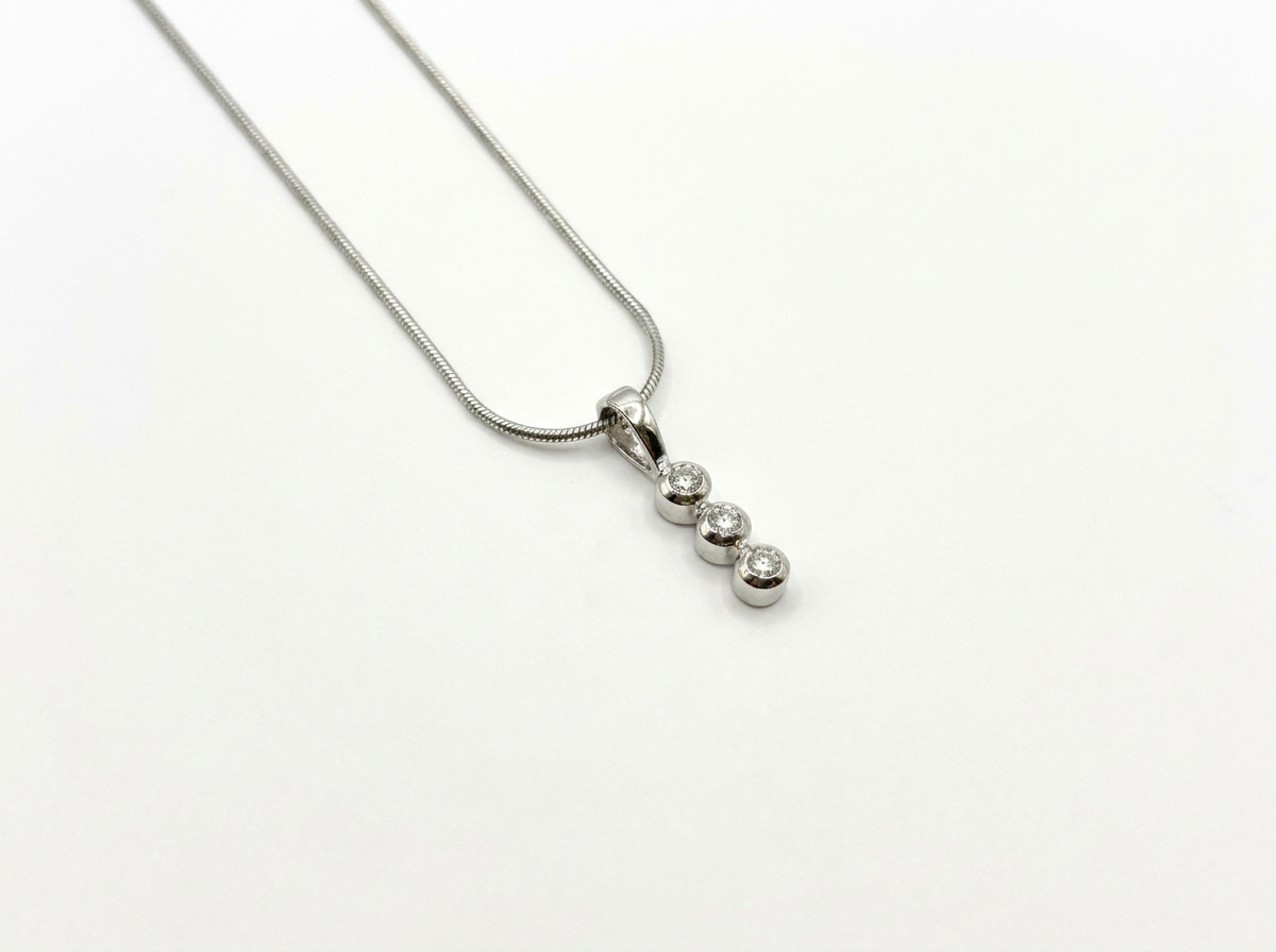 round cut diamond women's pendant | three stone drop design