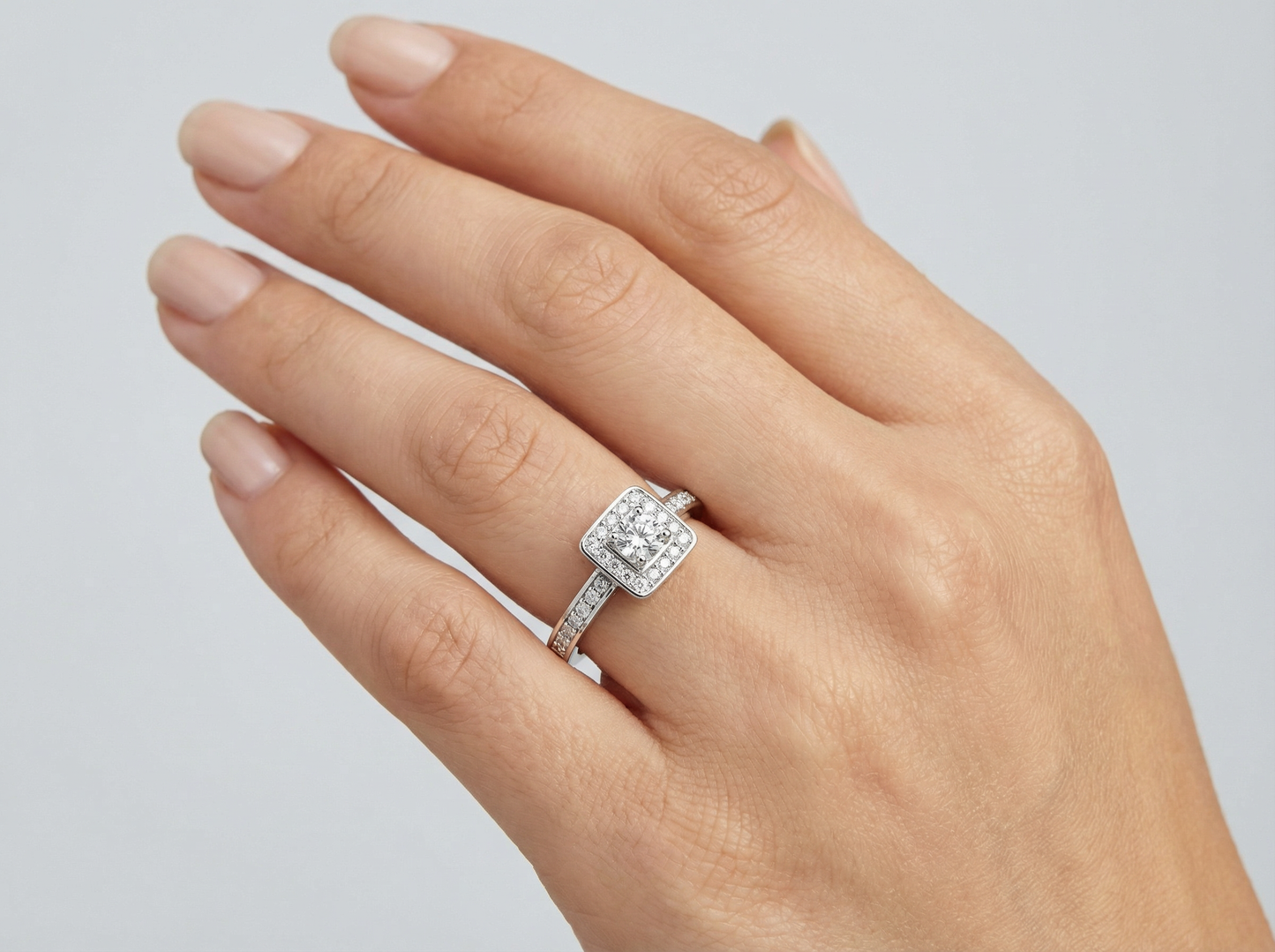 round brilliant diamond square halo engagement ring | unique square halo setting